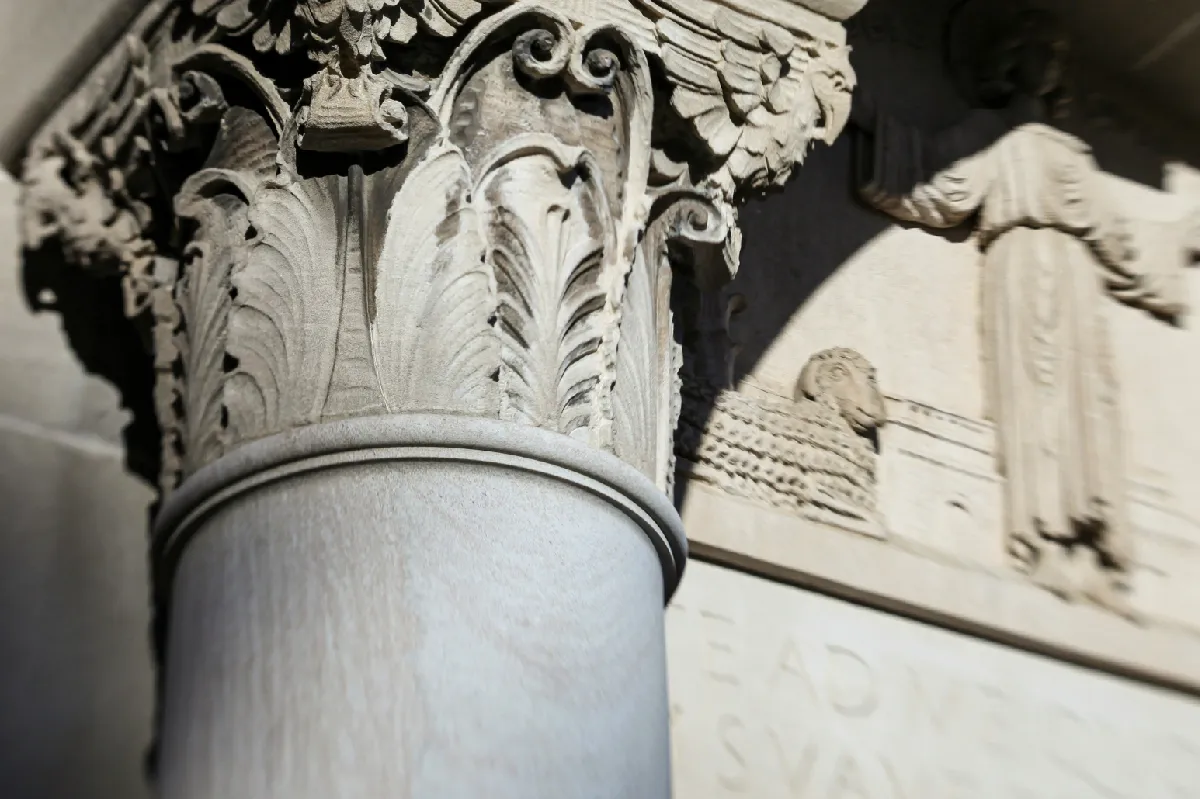Marble column of building on the University of Northwestern campus by Mick Haupt on Unsplash